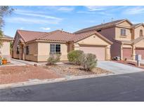 Charming single-story home featuring a desert-landscaped front yard and a two-car garage, perfect for comfortable living at 4043 Lilac Creek Ct, Las Vegas, NV 89122