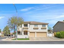 Charming two-story home featuring a two-car garage and well-maintained landscaping at 50 Desert Castle Ct, Henderson, NV 89012