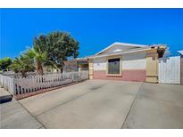 Charming single-story home featuring a well-maintained front yard and a long, spacious driveway at 5121 Gains Mill St, Las Vegas, NV 89122