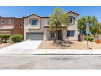 Charming two-story home features a low-maintenance yard, stucco exterior, and attached two-car garage at 3941 Copper Stone Ct, North Las Vegas, NV 89032