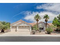 Charming single-story home featuring a tile roof, desert landscaping, and an attached three-car garage at 4612 Standing Bluff Way, Las Vegas, NV 89130