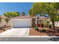 Charming single-story home with a two-car garage and a well-manicured front yard in a desirable neighborhood at 3597 Cherbourg Ave, Las Vegas, NV 89141