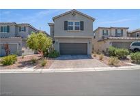 Charming two-story home with a two-car garage and low-maintenance landscaping, offering great curb appeal at 10630 Adobe Ranch St, Las Vegas, NV 89141