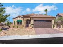 Charming single-story home featuring a gated front entrance and a two car garage at 2166 Alyssa Jade Dr, Henderson, NV 89052