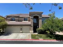 Charming two-story home featuring a three car garage, neutral paint scheme and well-maintained landscaping at 8812 Glenistar Gate Ave, Las Vegas, NV 89143