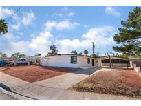 Charming single-story home features an oversized carport and desert landscaping at 2878 El Cajon St, Las Vegas, NV 89169