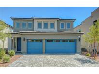 Charming two-story home with a spacious two car garage and a beautifully paved driveway at 629 Soaring Wings Ave, Las Vegas, NV 89183