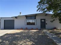 Charming single-story home featuring a well-maintained exterior and desert landscaping at 6409 Burgundy Way, Las Vegas, NV 89107