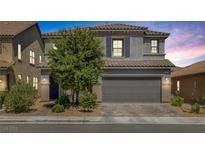 Charming two-story home featuring a gray exterior, tile roof, and a two-car garage at 7890 S Miller Ln, Las Vegas, NV 89113