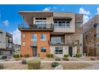 Modern three-story home featuring dual balconies and contemporary architectural design at 4336 Guava Ct # 0, Las Vegas, NV 89135