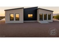 Modern home featuring minimalist landscaping and a unique contemporary design at 1321 Blagg, Pahrump, NV 89048