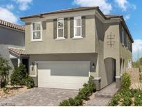 Charming two-story home showcasing a two-car garage, and inviting entrance at 7394 Daly Grove St, Las Vegas, NV 89113