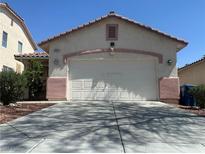 Charming single-story home featuring a two-car garage and desert landscaping at 8042 Palace Monaco Ave, Las Vegas, NV 89117