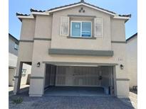 Two-story home with attached two-car garage, neutral color scheme, and stone accents on the first story at 10434 Luna Mezzo St Ave # Lot 188, Las Vegas, NV 89141