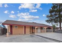 Charming single-story home featuring a welcoming covered porch and spacious front yard at 3715 Tabor Ave, North Las Vegas, NV 89030