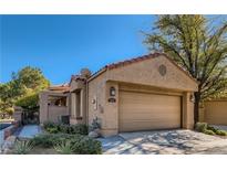 Charming single-story home with a well-maintained desert landscape and attached two car garage at 7201 Mission Hills Dr, Las Vegas, NV 89113