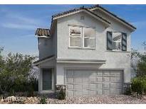 Charming two-story home features a neutral color scheme, attached garage and stylish architectural details at 9125 Rivington Ave, Las Vegas, NV 89148