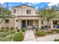 Inviting townhome features a well-manicured front yard and a charming covered porch at 3621 Arcadian Sea St, Las Vegas, NV 89106