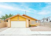 Charming single-story home with a two-car garage and low-maintenance landscaping at 4616 E Idaho Ave, Las Vegas, NV 89104