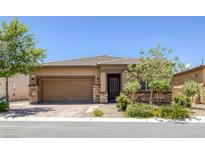 Charming single-story home with a well-manicured lawn and inviting curb appeal at 10181 Mount Harlow Ct, Las Vegas, NV 89141