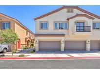 Beautiful two-story home with attached garages, neutral paint, and tile roof at 4725 Blaise Ave # 103, North Las Vegas, NV 89084