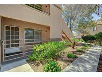 Charming home exterior with a well-maintained garden and inviting entryway at 9070 Spring Mountain Rd # 114, Las Vegas, NV 89117