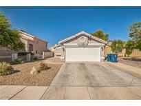 Charming single-story home featuring a two-car garage, low-maintenance landscaping, and a classic design at 2229 Bowstring Dr, Las Vegas, NV 89142