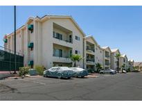 Condominium building with multiple stories, balconies, and assigned parking spots at 3550 Bay Sands Dr # 3089, Laughlin, NV 89029