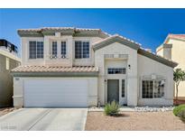 Charming two-story home with a well-maintained lawn and a two-car garage at 7813 Falconwing Ave, Las Vegas, NV 89131