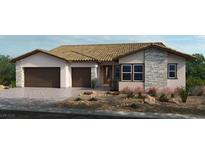 Charming single-story home featuring stone accents, desert landscaping, and a two-car garage at 227 Paraggi Bay Dr, Henderson, NV 89011