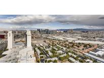 Expansive aerial view showcasing The Palms Casino Resort and the vibrant Las Vegas cityscape against a cloudy sky at 4381 W Flamingo Rd # 5220, Las Vegas, NV 89103