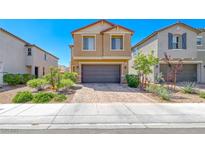 Charming two-story home with brick paver driveway, mature landscaping and a two-car garage at 6335 Pacific Sky St, North Las Vegas, NV 89081