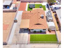 Aerial view of a fenced home with a covered carport, trampoline and an RV in the backyard at 706 Red Lake Way, Las Vegas, NV 89110