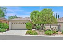 Charming single-story home with a well-manicured front yard and a two-car garage at 2839 Goldcreek St, Henderson, NV 89052