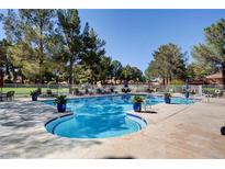 Resort-style pool area with ample seating and lush landscaping, perfect for relaxation and community enjoyment at 2851 S Valley View Blvd # 1039, Las Vegas, NV 89102