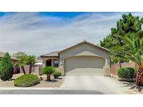 Charming single-story home with a well-manicured landscape and a two-car garage at 3307 Forestina Ct, Las Vegas, NV 89122