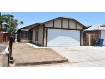 Charming single-story home featuring a two-car garage and traditional architecture at 4041 Saguaro Ln, Las Vegas, NV 89110