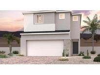 This is a two-story home with neutral colors, a two-car garage, desert landscaping, and a beautiful blue sky at 8538 W Agate Ave, Las Vegas, NV 89113