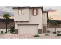 Charming two-story home with a neutral color scheme, desert landscaping and a two car garage at 8544 W Agate Ave, Las Vegas, NV 89113