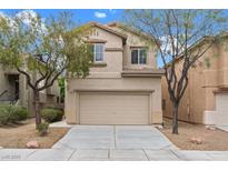 Charming two-story home featuring a neutral color palette, well-maintained landscaping, and an attached two-car garage at 9709 Fast Elk St, Las Vegas, NV 89143