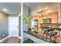 Inviting kitchen with stainless steel appliances and a breakfast bar is perfect for entertaining at 220 E Flamingo Rd # 317, Las Vegas, NV 89169