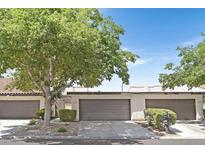 Charming single-story home with mature landscaping, a two-car garage, and a welcoming facade at 2558 La Fortuna Ave, Las Vegas, NV 89121