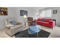 Inviting living room features stylish seating and decor, ideal for relaxation and entertaining guests at 270 E Flamingo Rd # 106, Las Vegas, NV 89169