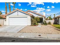 Charming single-story home featuring a two-car garage and low maintenance desert landscaping at 371 Cambray St, Henderson, NV 89074