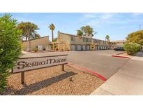 Sierra Madre townhomes show an inviting community with private garages and lush landscaping at 5043 Spencer St # A, Las Vegas, NV 89119
