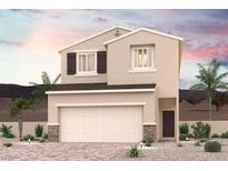 Charming two-story home with a neutral color palette, attached two car garage, and desert landscaping at 8556 W Agate Ave, Las Vegas, NV 89113