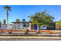 Charming single-story home with landscaped front yard and desert landscaping at 1564 Vegas Valley Dr, Las Vegas, NV 89169