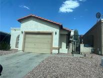 Cozy single-story home with desert landscaping, and an attached two-car garage at 2362 Sierra Sunrise St, Las Vegas, NV 89156