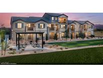 Charming townhome with attractive landscaping, manicured lawns, and a covered patio area for outdoor enjoyment at 641 Bellus Pl # Lot 149, Henderson, NV 89015