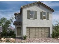 Charming two-story home with a neutral colored exterior, a two-car garage, and well-placed shuttered windows at 9113 Rivington Ave, Las Vegas, NV 89148